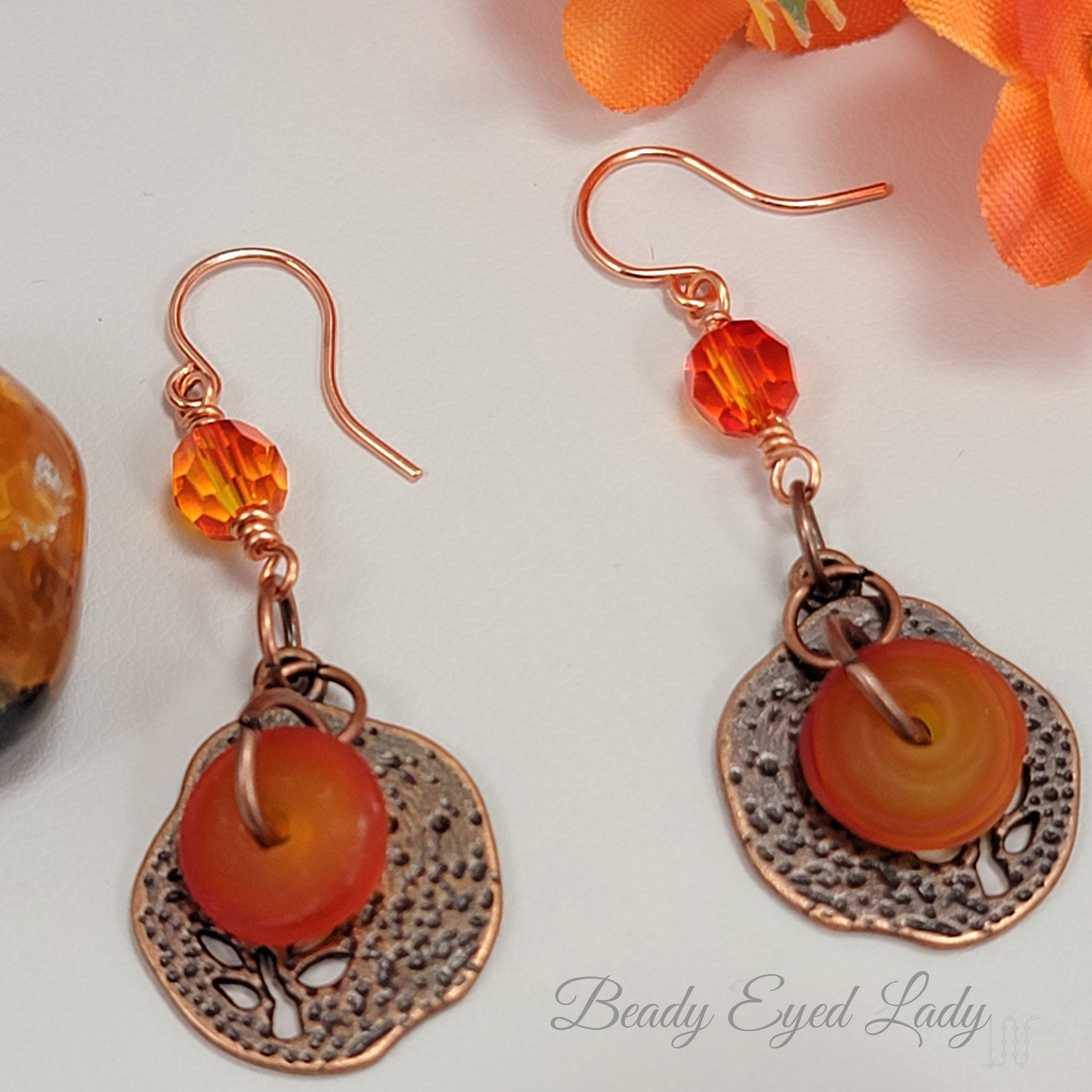 Orange lampwork and Austrian crystal copper earrings