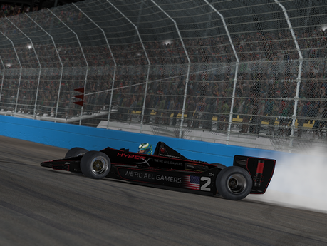 Karam makes late-race pass, wins third straight at Phoenix