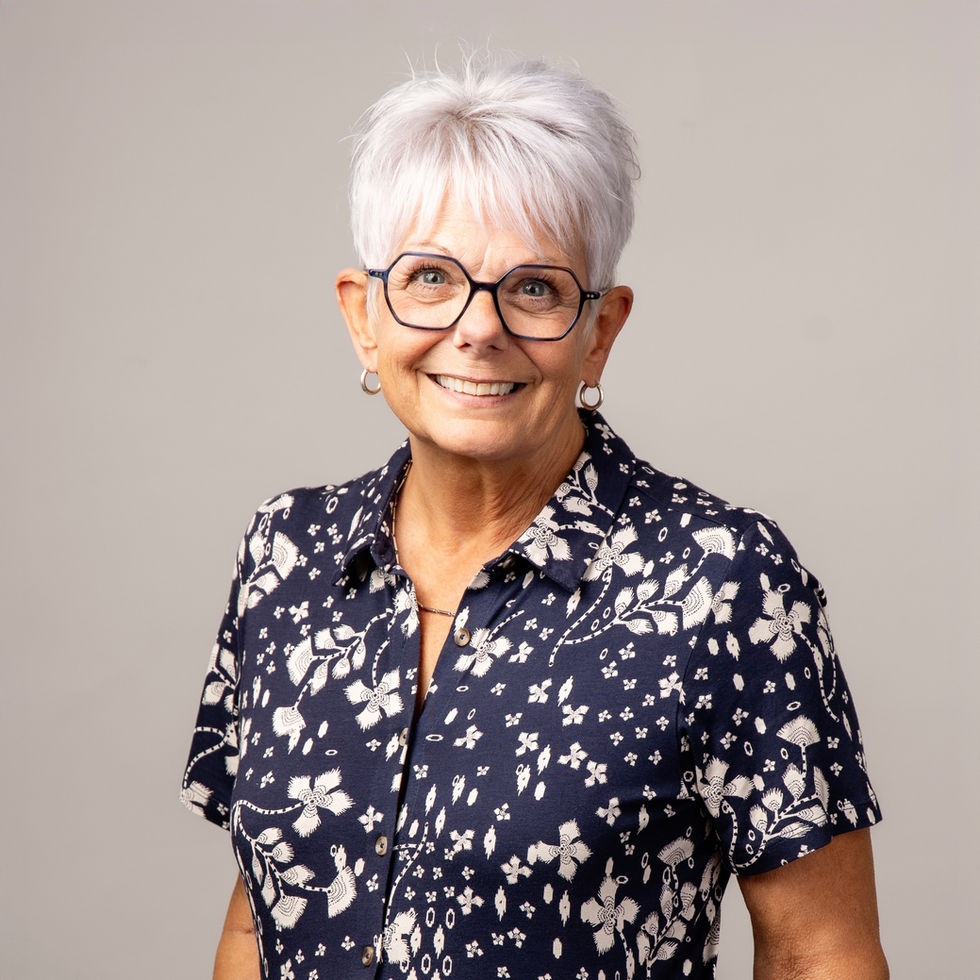 Warm corporate headshot for a female professional