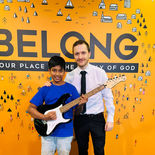 Guitar teacher with a student during a one-on-one guitar lesson at Evolved Virtual Guitar Lessons.