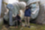 Mathis and Stefan in front of industrial vents.