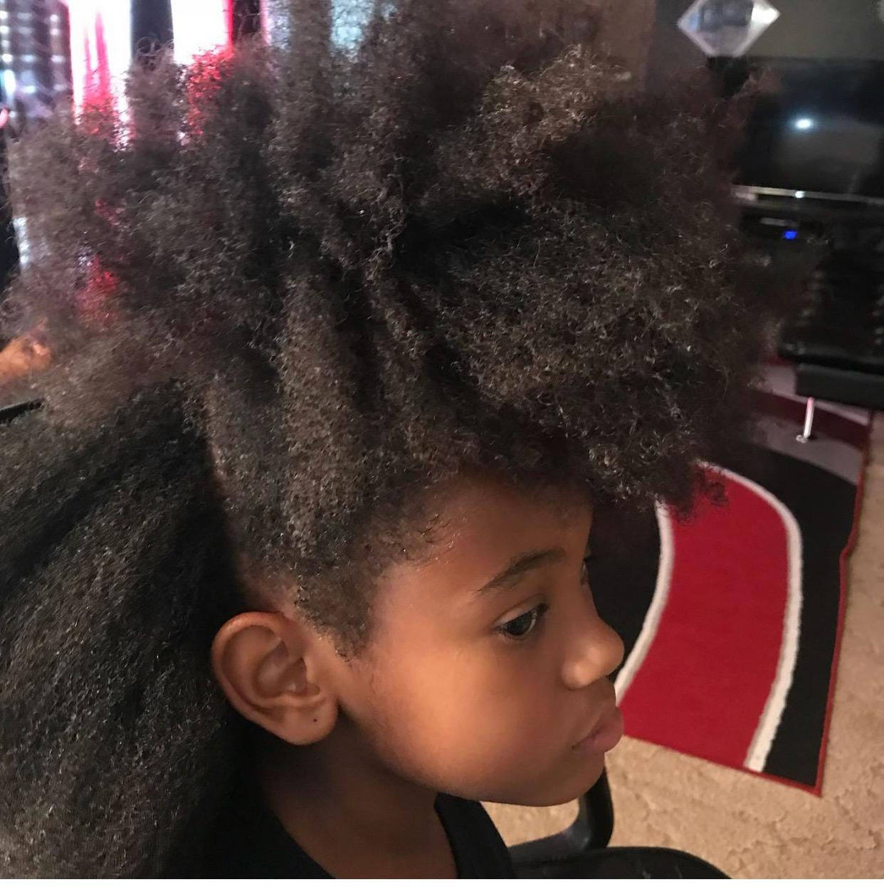 Cornrows with natural hair no extensions added and twisted at the ends 