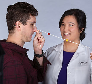 Dr. Kayla Ueda O.D. - Vision Therapy Exercises With Patient - Optometrist -Runway Optometr
