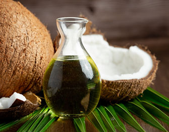 jug-coconut-oil-whit-coconut-put-dark-background (1).jpg