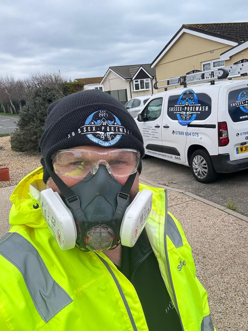 Sussex-PureWash wear PPE respirator
