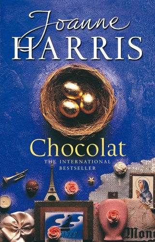 The cover of Joanne Harris's, 'Chocolat' - Purple background with a small nest containing three chocolate eggs wrapped in golden paper