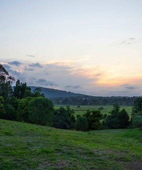 Sunset over the hills and valley at Hidden Camp, Glenwood QLD