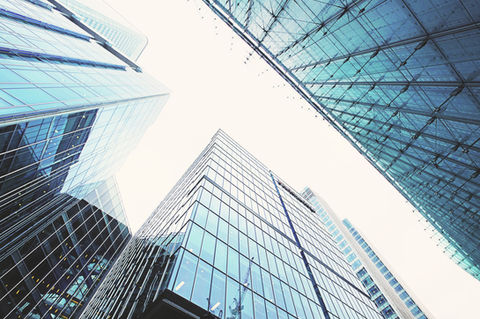 tall buildings looking from the ground up