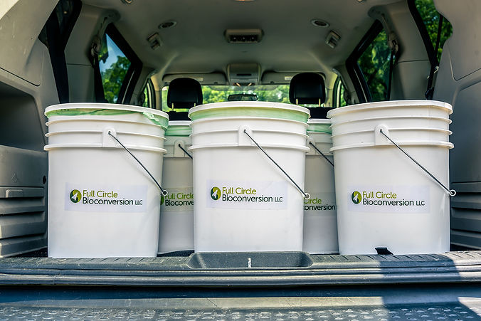 Van with compost buckets