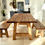 Thumbnail: Farmhouse dining table and bench set on chunky A-frame timber legs