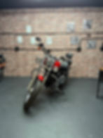 Red Harley Davidson motorcycle in garage