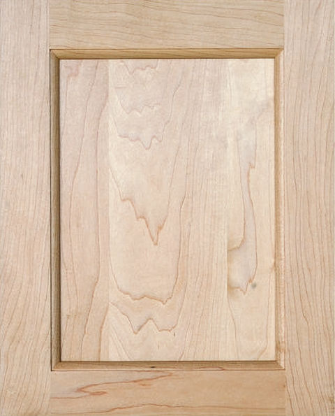 Close-up of a light wood cabinet door with a framed center