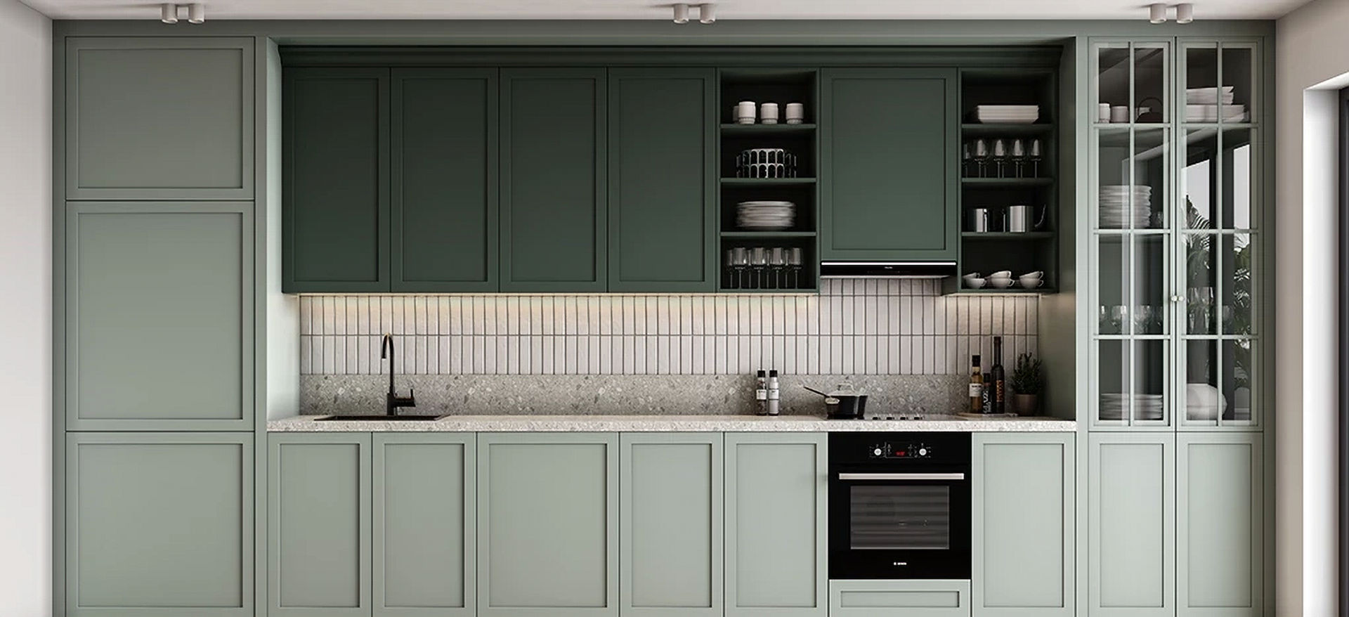 Modern kitchen with green cabinets, oven, and white tile backsplash for design.