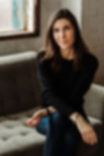 Man massaging a pregnant woman's shoulders