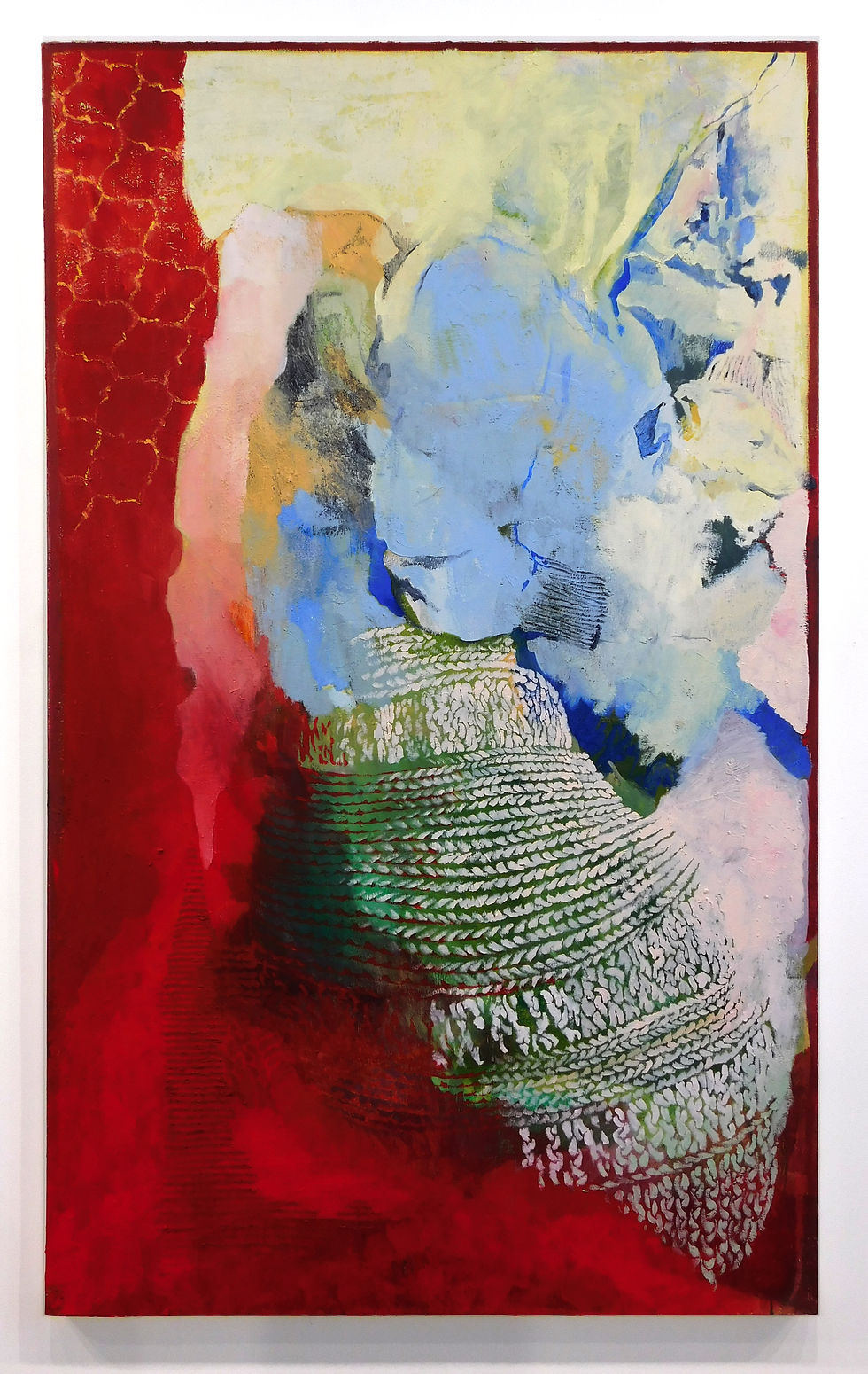 abstract painting with red on left side with green and white knit pattern on bottom center