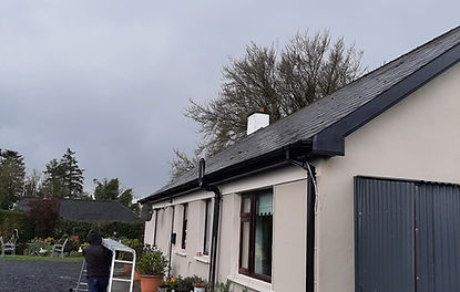 House with new gutters and roofing