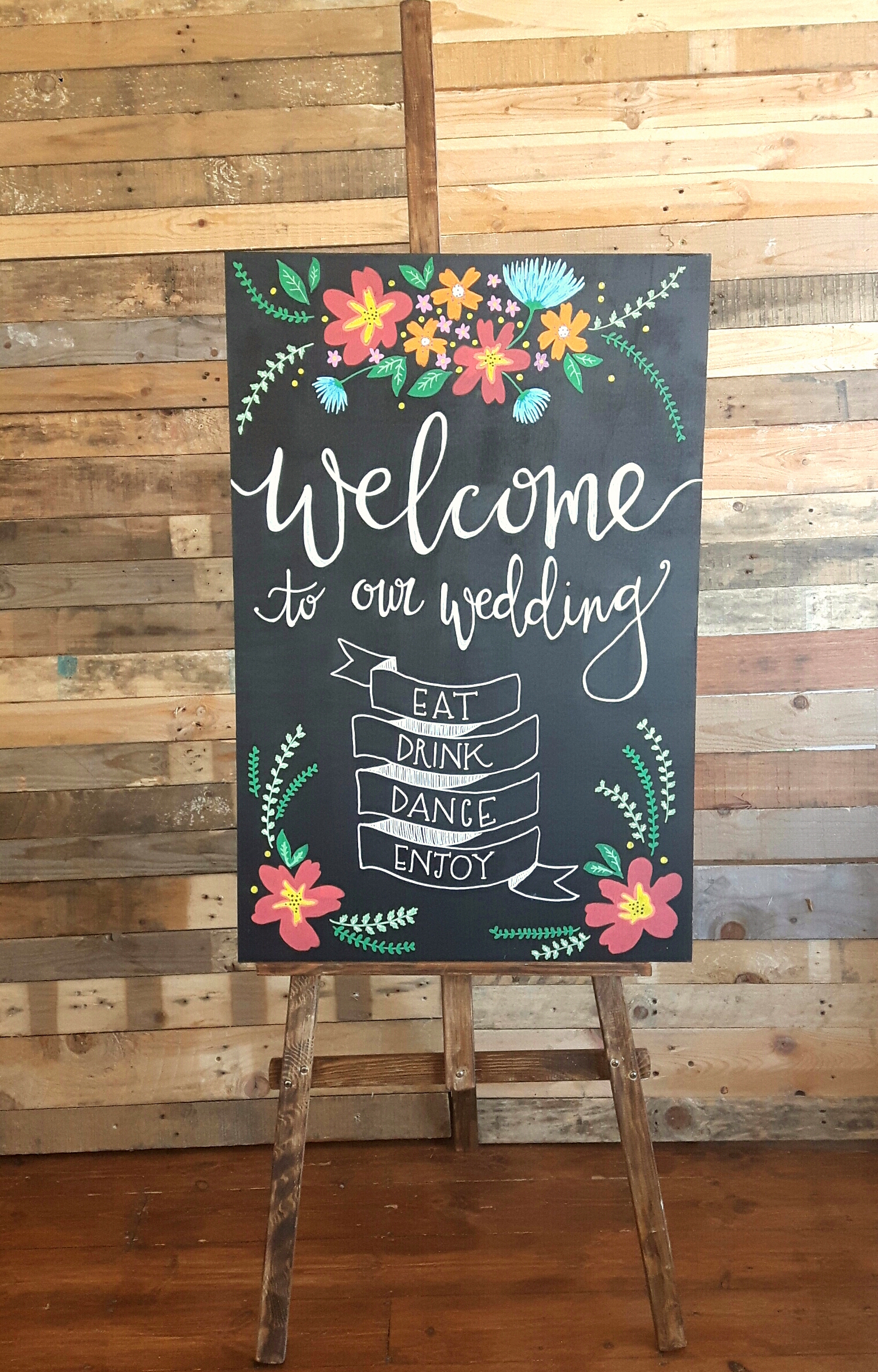 'Welcome' sign and easel