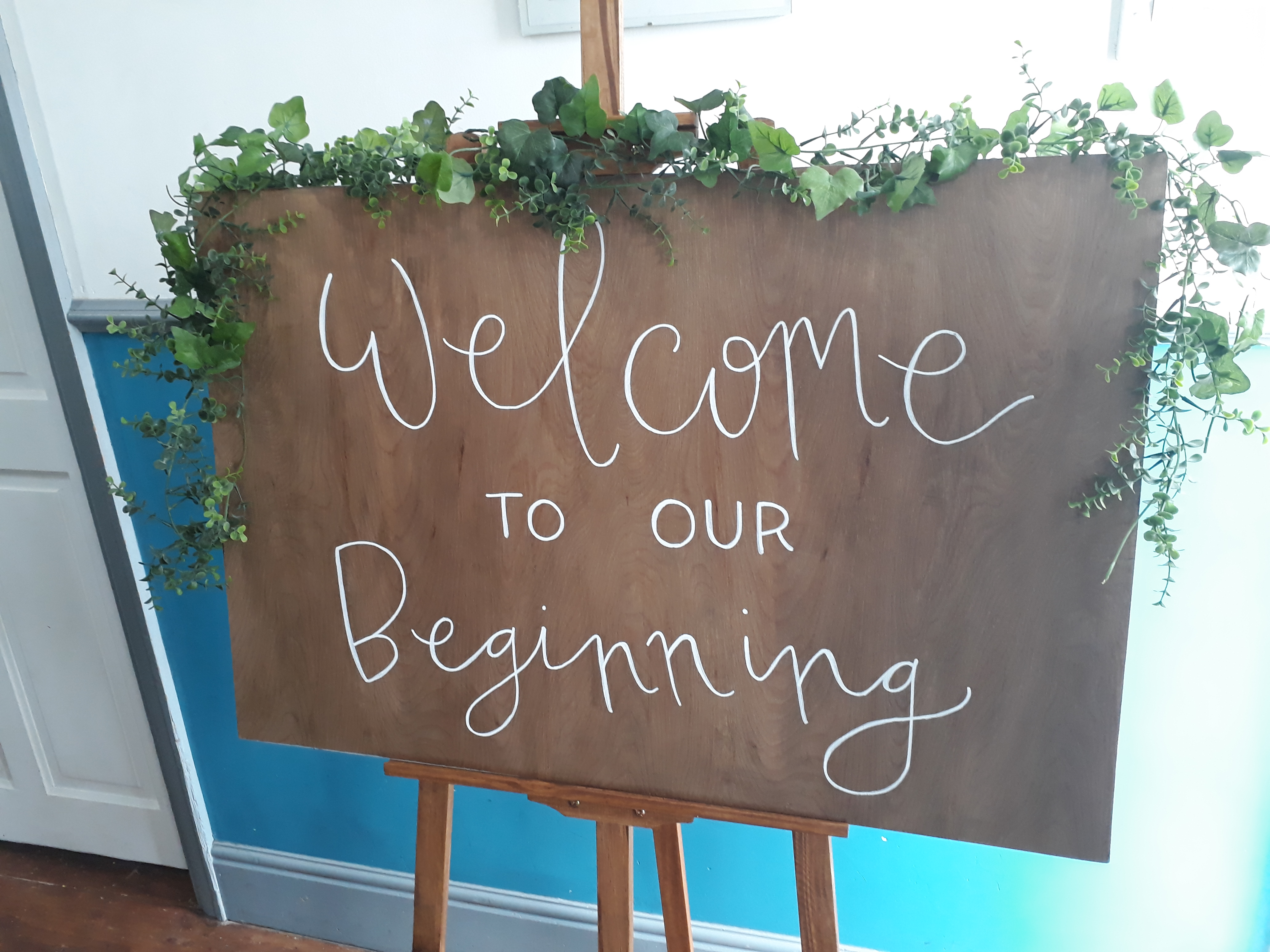 Welcome sign and easel