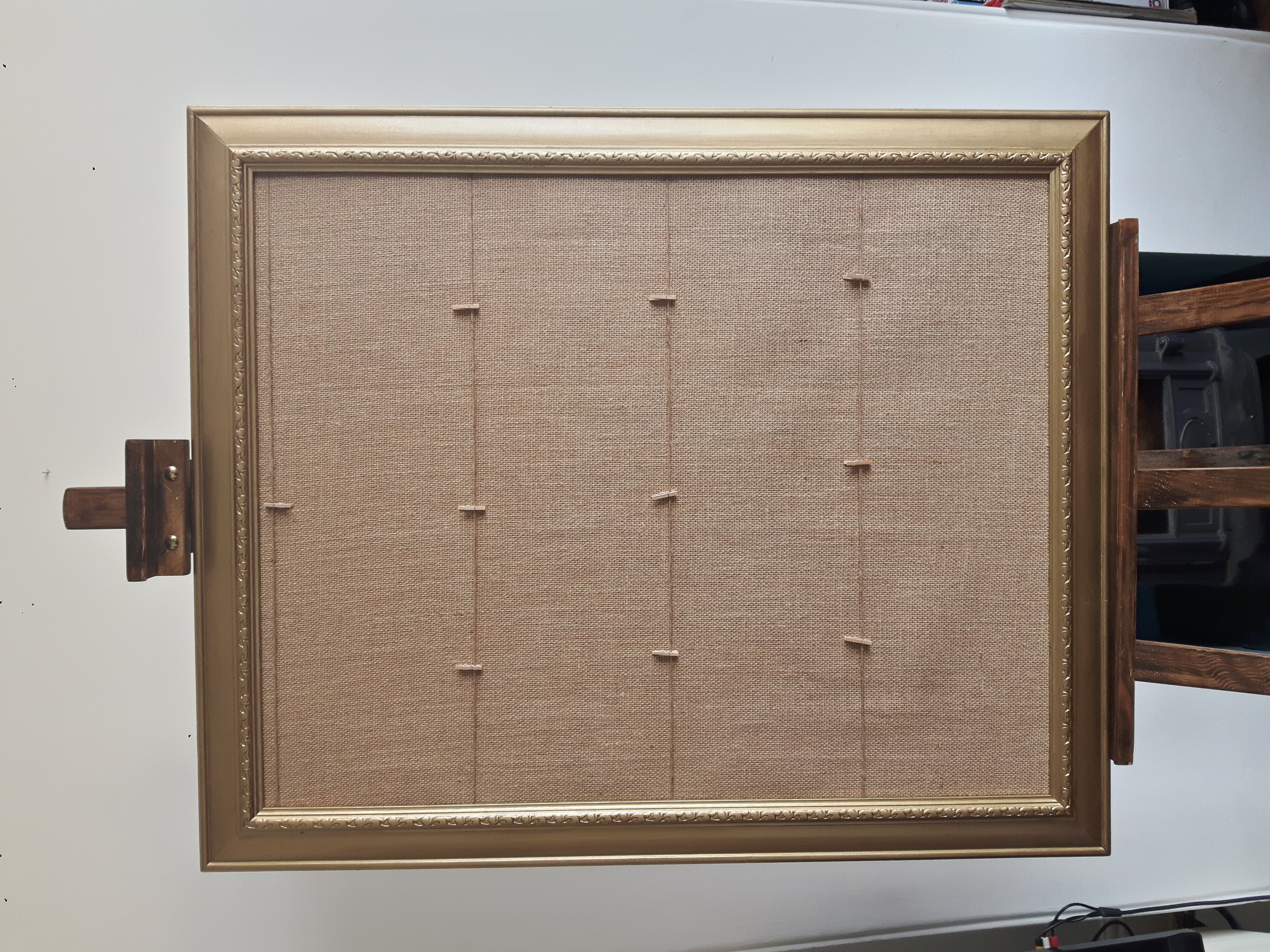 Gold frame, hessian back