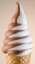 Chocolate and vanila swirl soft serve on a cone