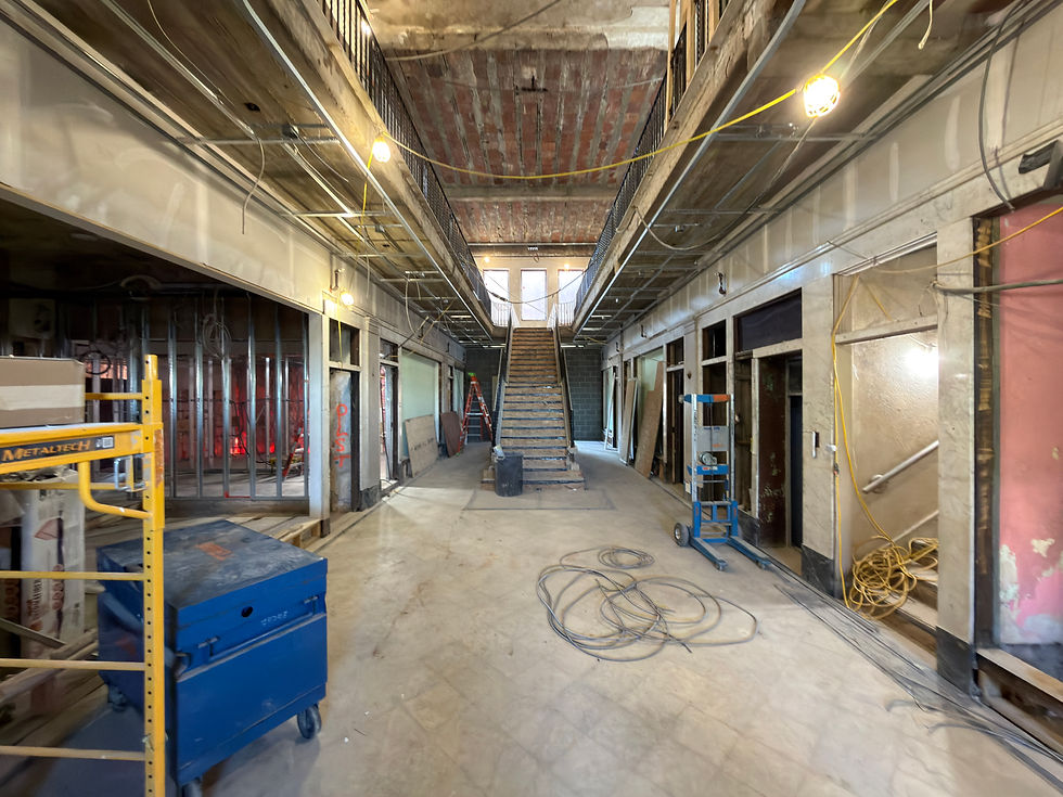 The building's arcade once held retail and office tenants and served as the entrance to the Melba Theater.
