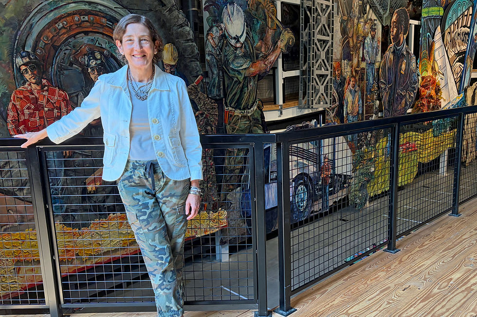 Jennifer Chrein, executive director of the American Mural Project in Winsted. "This space is glorious - it's like a cathedral." Photo: Carl Wiser