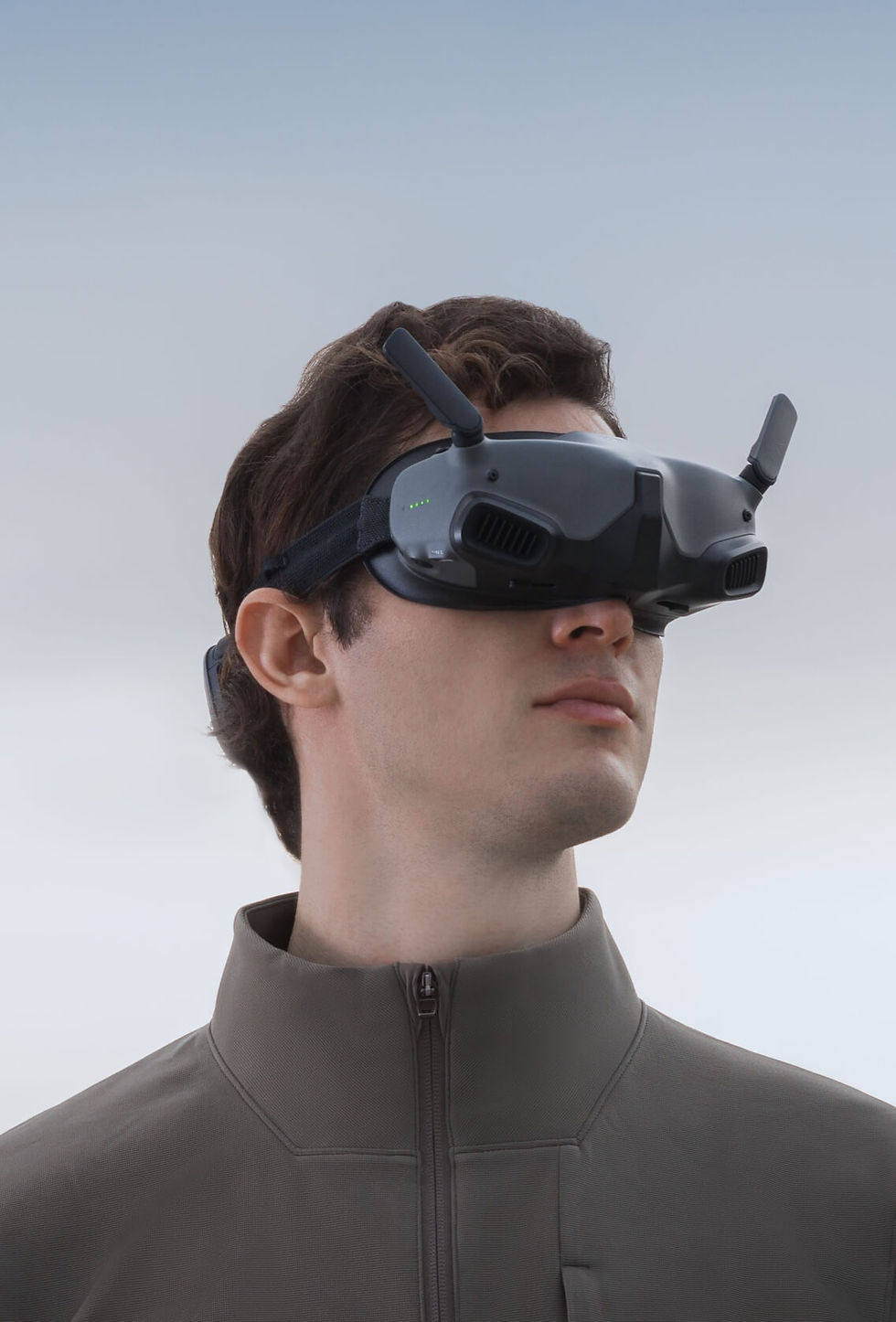 Licensed drone pilot wearing pilot VR goggles