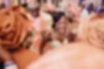 Bride celebrating with guests during cultural wedding moment
