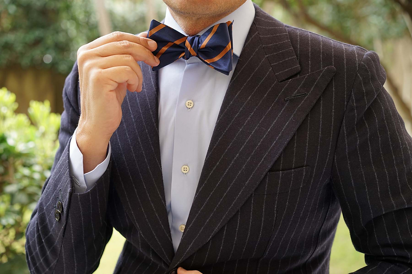 NavyBlueBowTieUntiedwithStripedB.png