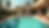 Eye-level view of a cozy poolside lounging area