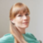 portrait-of-red-haired-mid-adult-woman-looking-at-2022-03-04-01-55-05-utc.jpeg