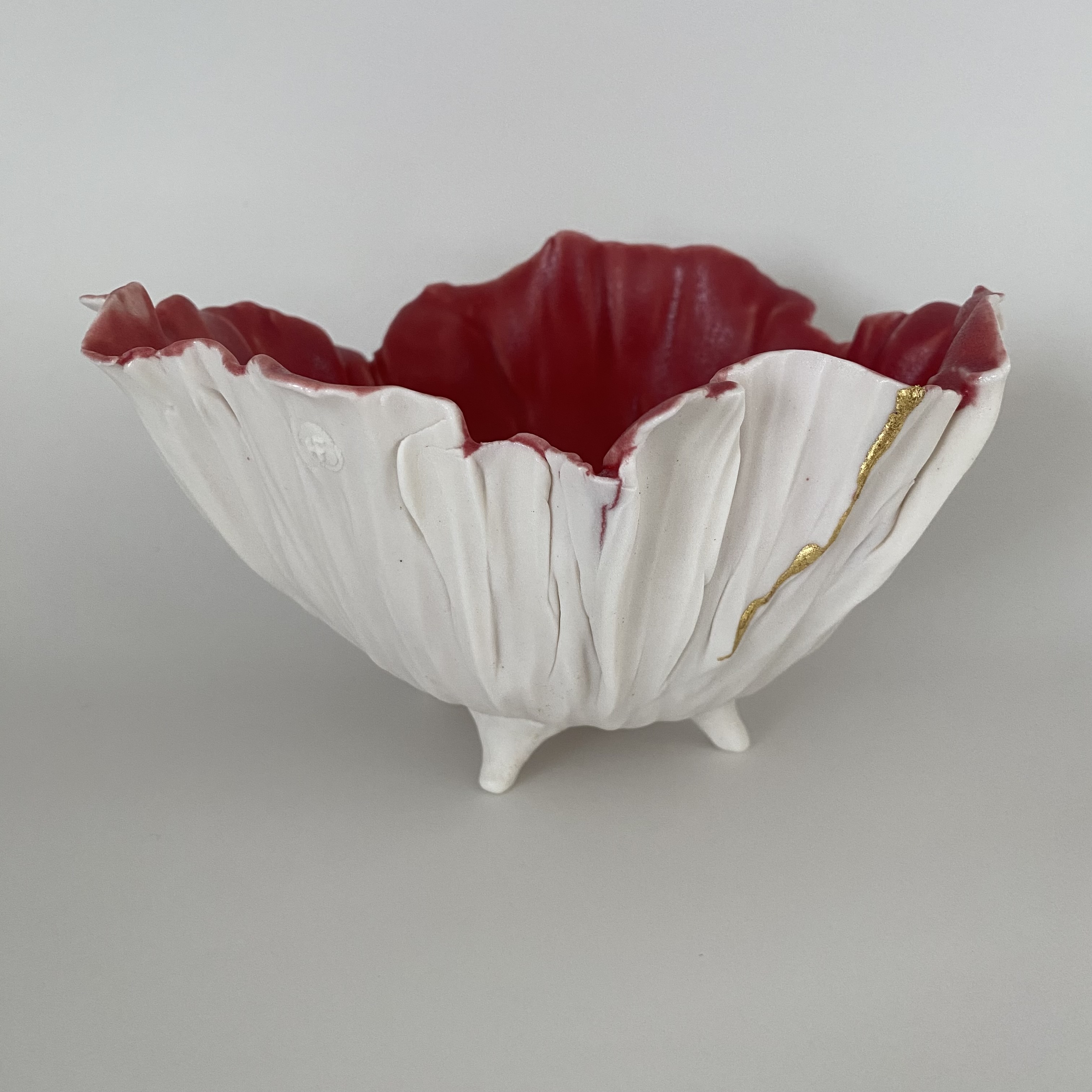 Bol froissé blanc et rouge