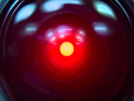 The red unblinking eye of an AI