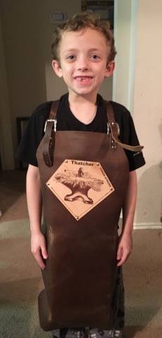 Thatcher is sporting his new Forge-Apron that gave him room to grow.