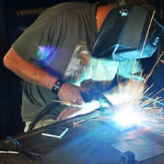 Metal sculptor David Norrie teaches welding at his blacksmithing school