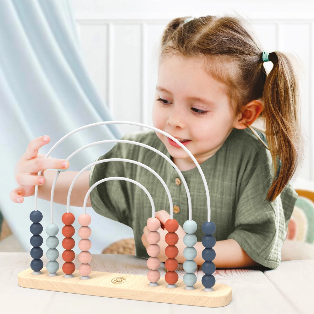 girl playing with abacus