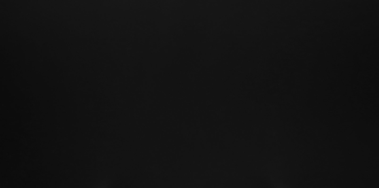A solid black countertop stone option that features no grains or speckles. Solid black stone