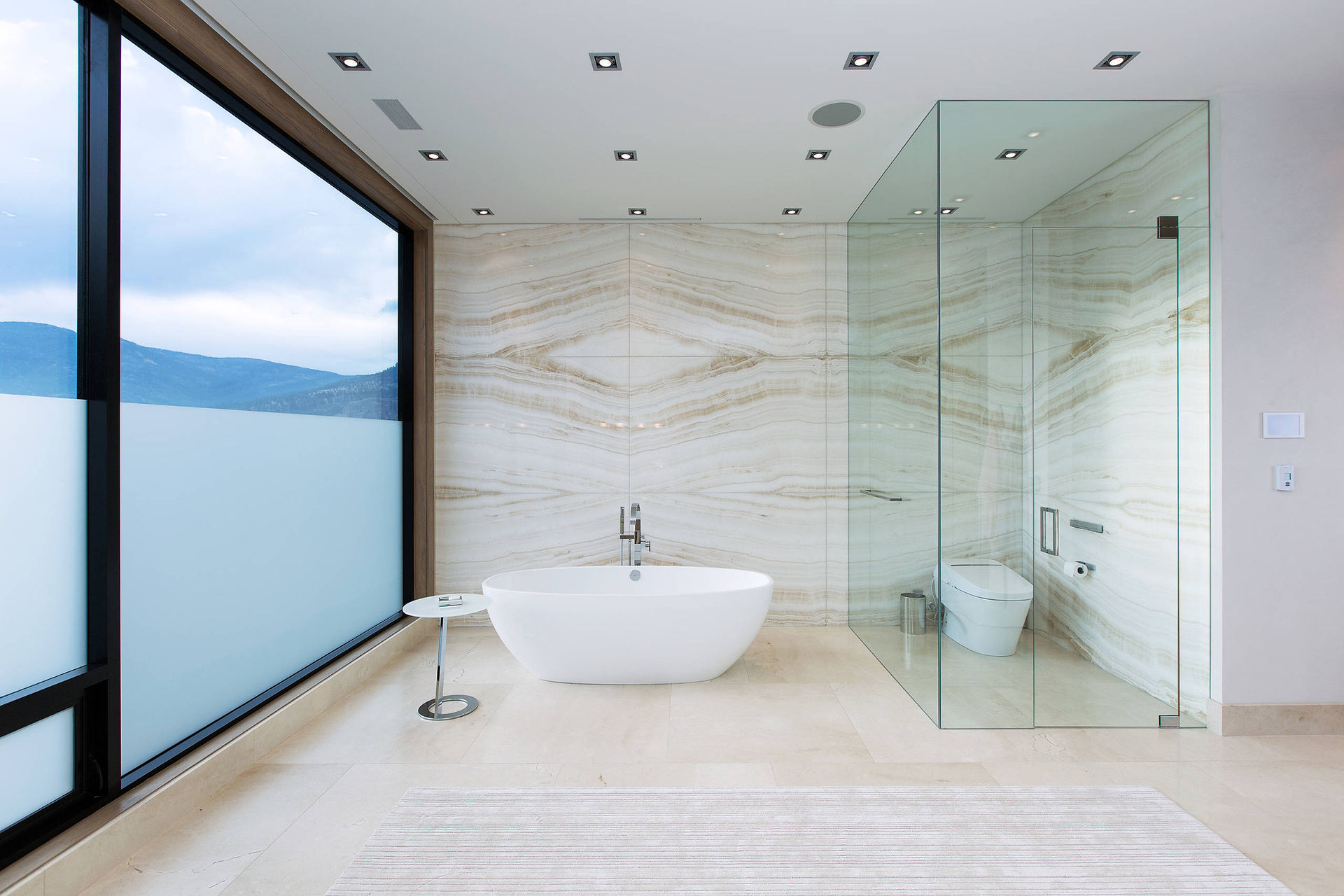 Book Matched Calacatta Shower Walls In A Bright And Airy Open Concept Bathroom