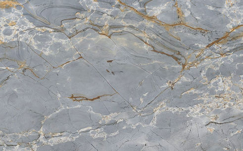 A quartzite inspired stone that features a sky blue backdrop featuring golden veins that add rich flair