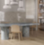 Thumbnail: A table top created with porcelain slabs, the base is made of stone as well. Porcelain blue roma in a serene dinner table area 