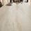 Thumbnail: Close-up of a kitchen countertop made of Travertino Ivory stone, featuring soft beige tones with fine natural veining
