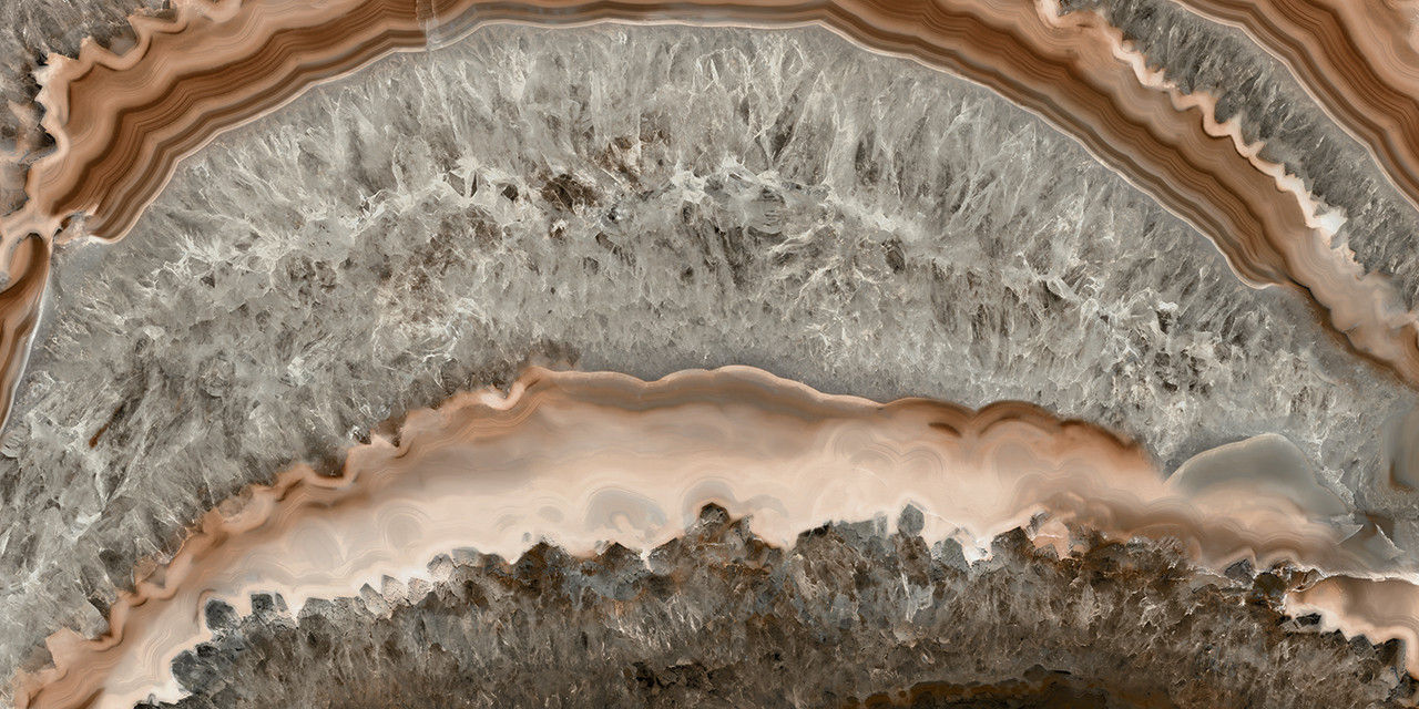 Porcelain of earthy hues, predominantly featuring a rich palette of browns, from deep chocolate tones to warm caramels