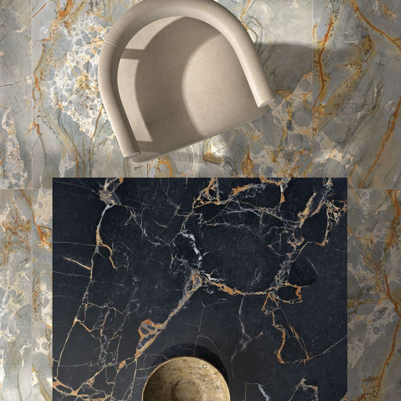 A luxury dining table crafted from a Port Gold porcelain slab, highlighting the high-gloss reflective finish and the contrast