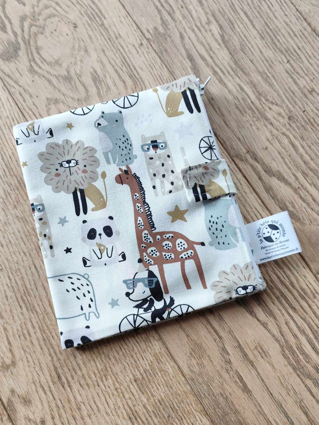 coloriage lavable avec couverture à motifs chiens à vélo