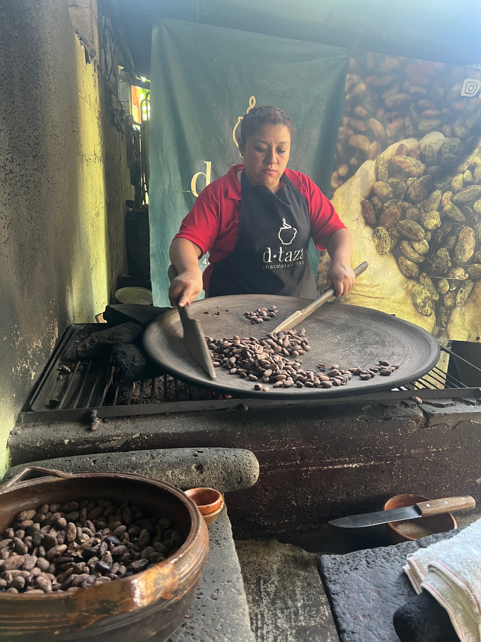 Traditional roasting of cacao during a Guatemalan chocolate workshop.