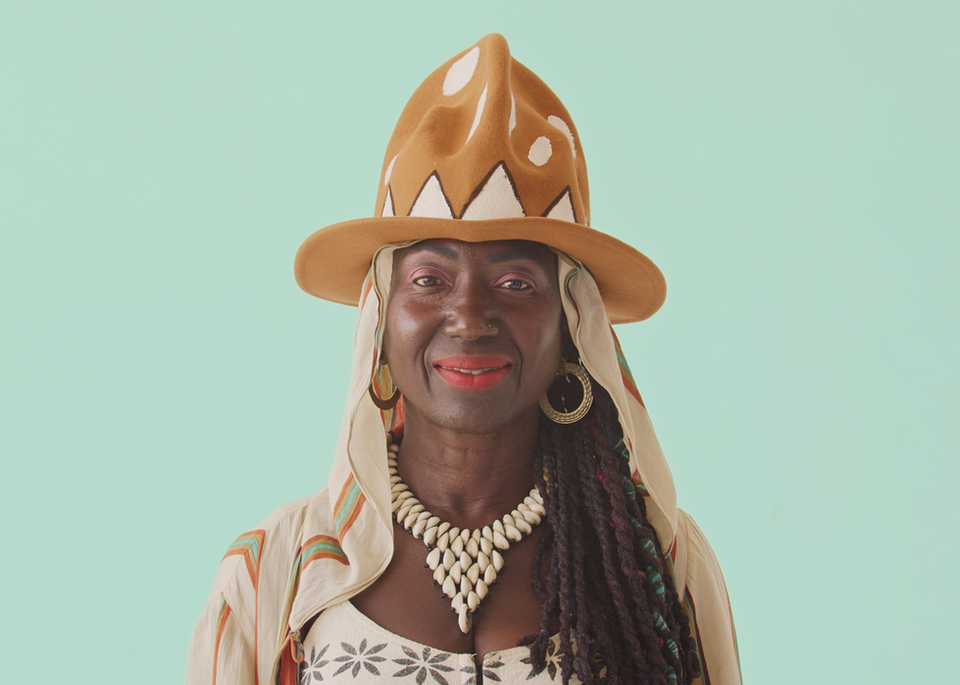 Funmi wearing a yellow hat