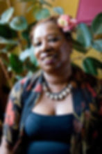 Portrait of Tekima Berlack with rose in her hair