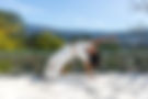 Pam Anand performing a backbend on her terrace at Shakti Rio Mino retreat center in Galicia, Spain