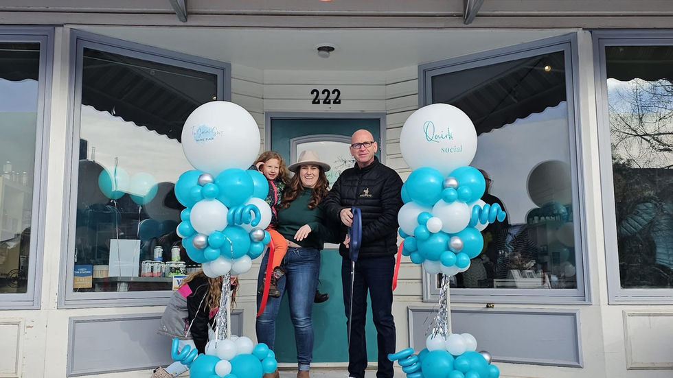 Teal balloon columns for store grand opening in Cochrane

