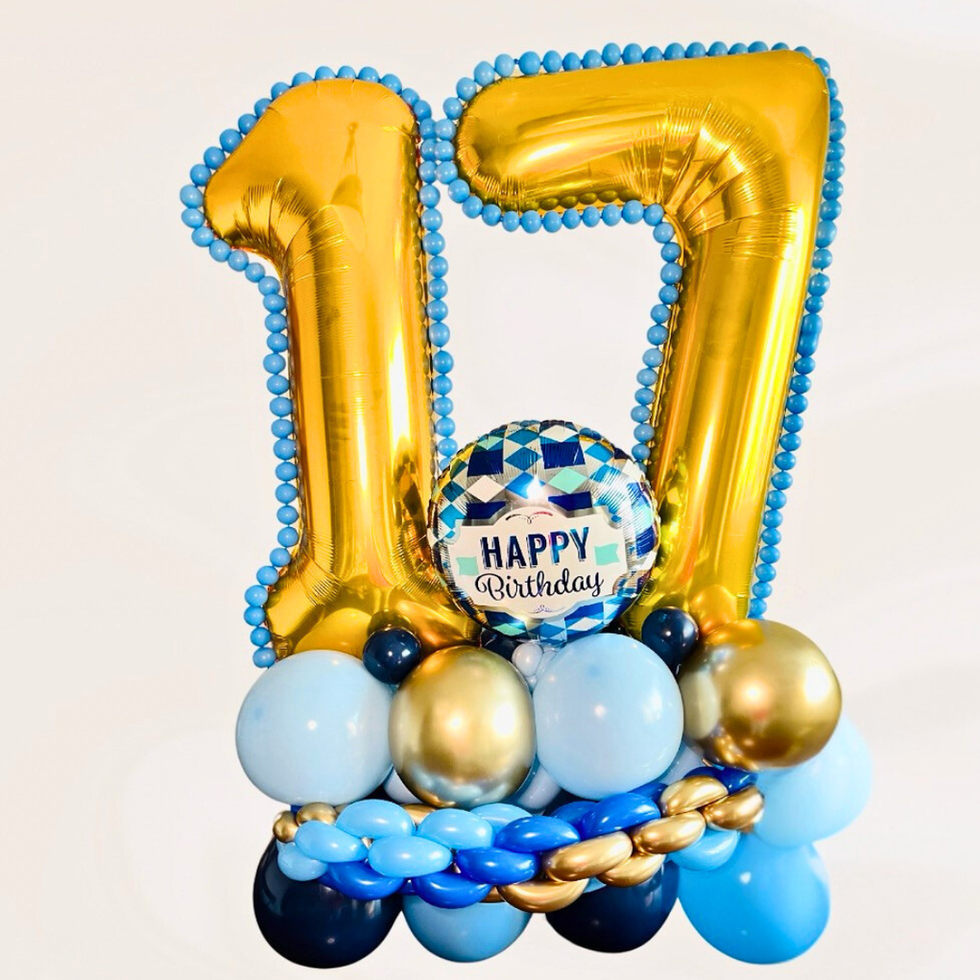 Blue and gold 17th birthday balloon arrangement by Orchid Balloon Boutique in Calgary